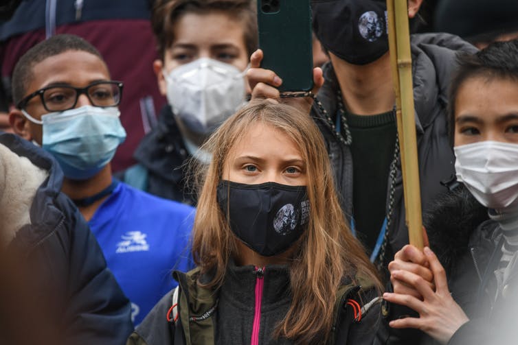 Greta Thunberg with other young protesters.