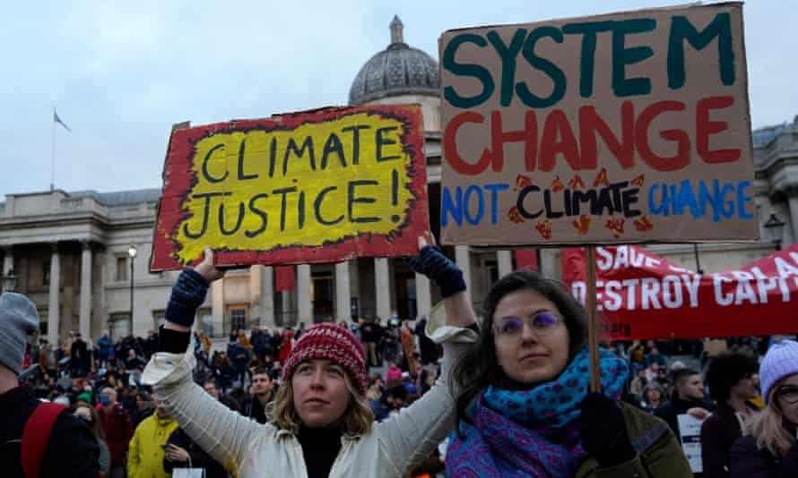 Protesters gather in Trafalgar Square having marched from the City of London.