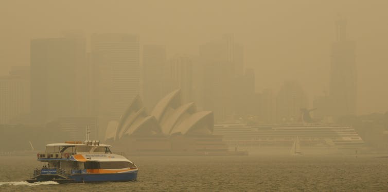 The Sydney Opera House is shrouded in haze from bushfire smoke.