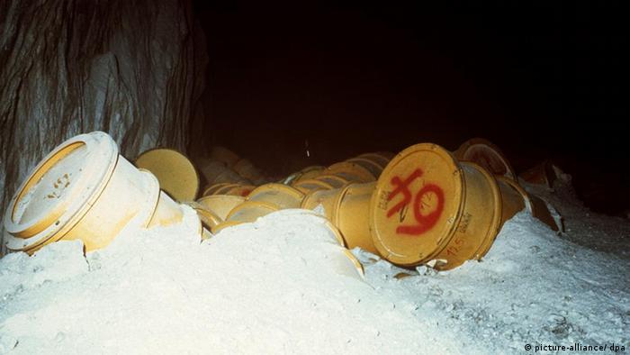 Barrels of nuclear waste lie on the ground in Asse.