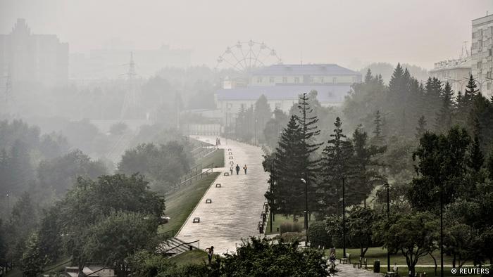 A general view shows the Siberian city of Krasnoyarsk covered with smoke from forest fires, Russia, August 7, 2021