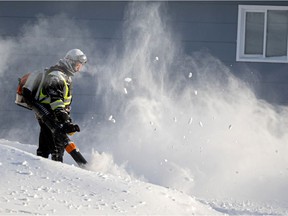 Saskatoon residents took to the streets to clear snow during freezing cold temperatures. Photo taken in Saskatoon on Monday, December 27, 2021.