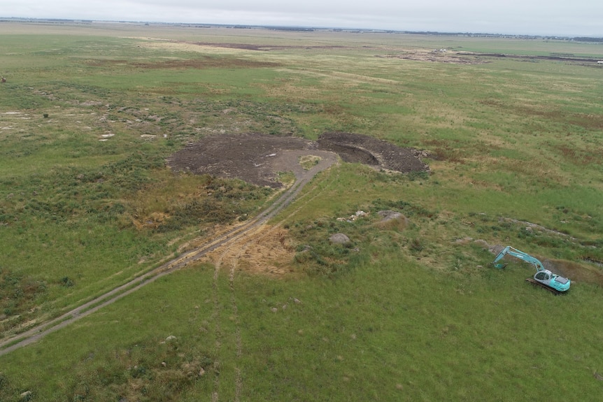 A pit in a paddock behind the Bamganie pet cremation service where horses and other animals are buried