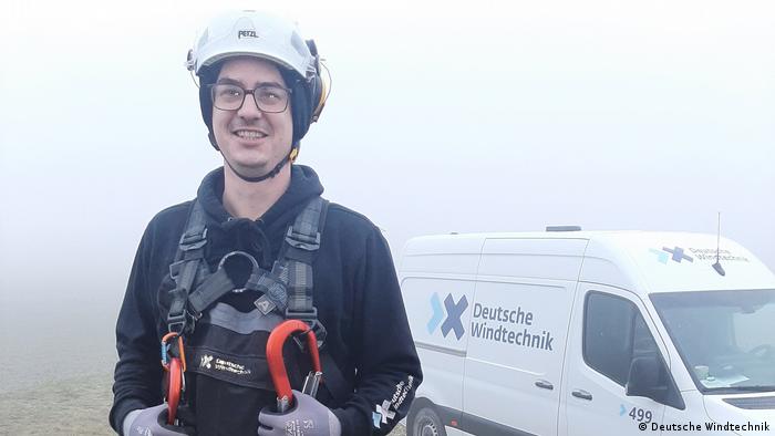 Portrait of Tim Schmolowski in his maintenance gear