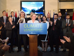 Environment Minister Steven Guilbeault, at far right, then an environmental consultant, is shown with then-Premier Rachel Notley as she unveiled Albertas climate strategy in November 2015.