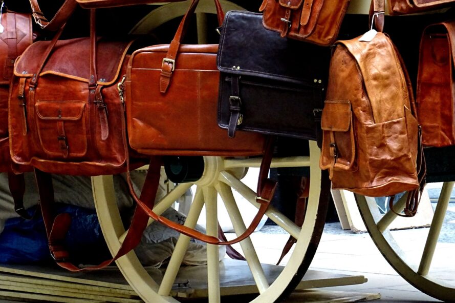 Leather bags hanging from a carriage