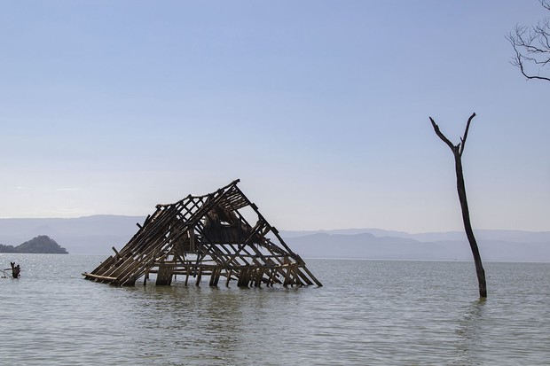 A house with floodwaters up to the roof  Getty Images