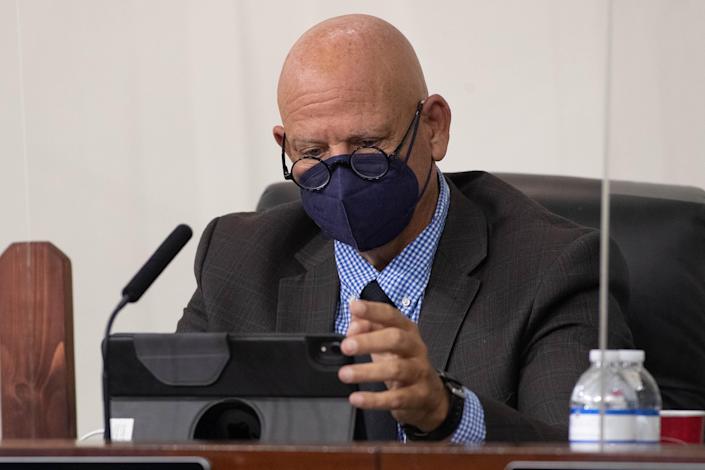 Leon County Commissioner Jimbo Jackson uses his iPad during a commission meeting at the Leon County Courthouse Tuesday, Sept. 14, 2021.