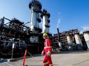 A Shell employee walks past the company's Quest Carbon Capture and Storage (CCS) facility in Fort Saskatchewan, Alberta. 