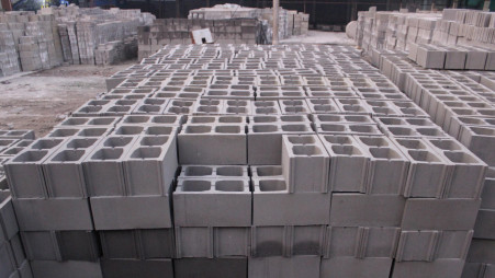 Stone dust is one of the essential elements in making blocks and bricks. Photo: TBS 