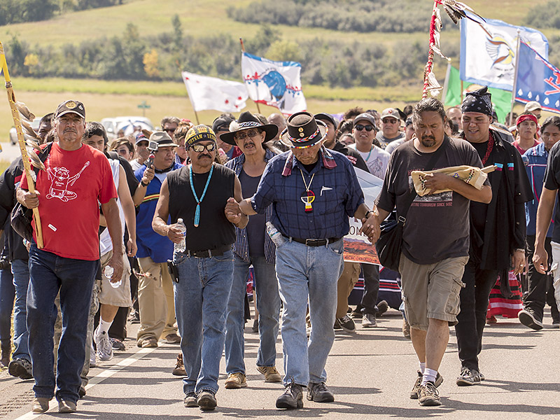 Indigenous water keepers march in opposition to the Dakota Access pipeline at the Sacred Stone Camp near Cannon Ball, North Dakota in 2016.