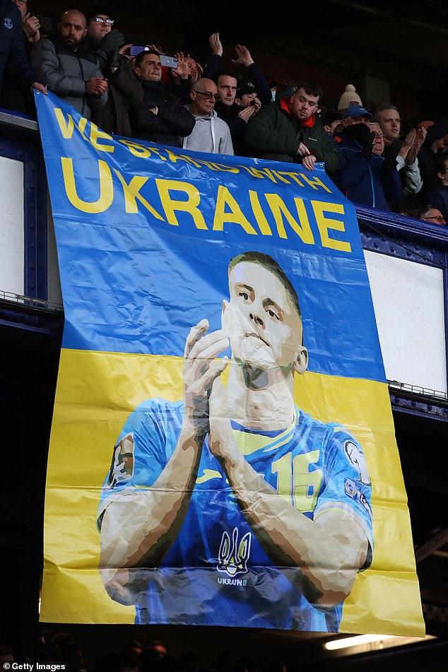 A banner was held by a fan in theGwladys Street End which read 'We stand with Ukraine'