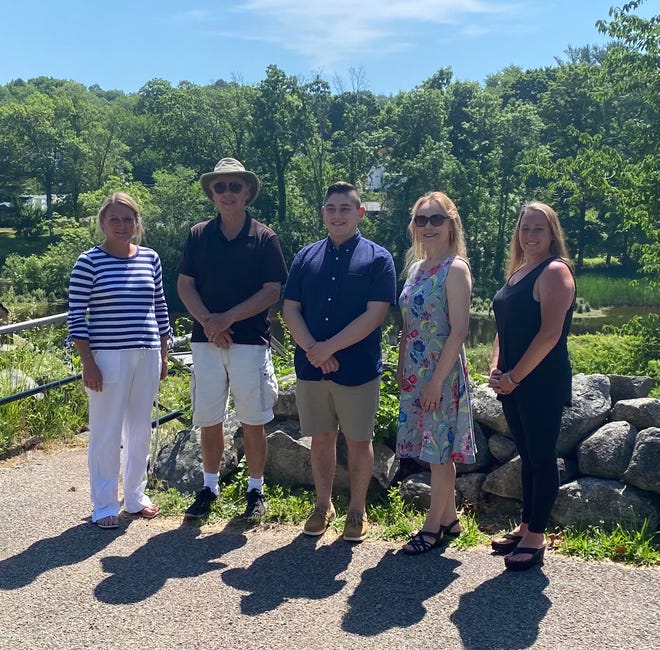 Pictured are Saugus River Watershed Council Executive Director Mary Lester, Vice President Doug Heath, Pam Harris Memorial Scholarship recipient Zackary Moran, President Debra Panetta and Treasurer Jackie Mercurio.