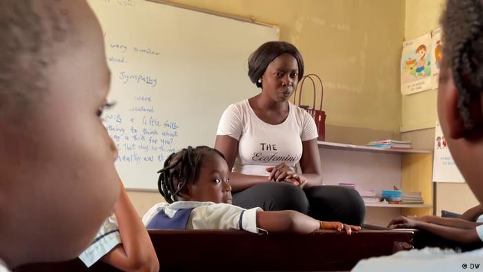 Adenike Oladosu, eco-feminist from Nigeria, talking to pupils