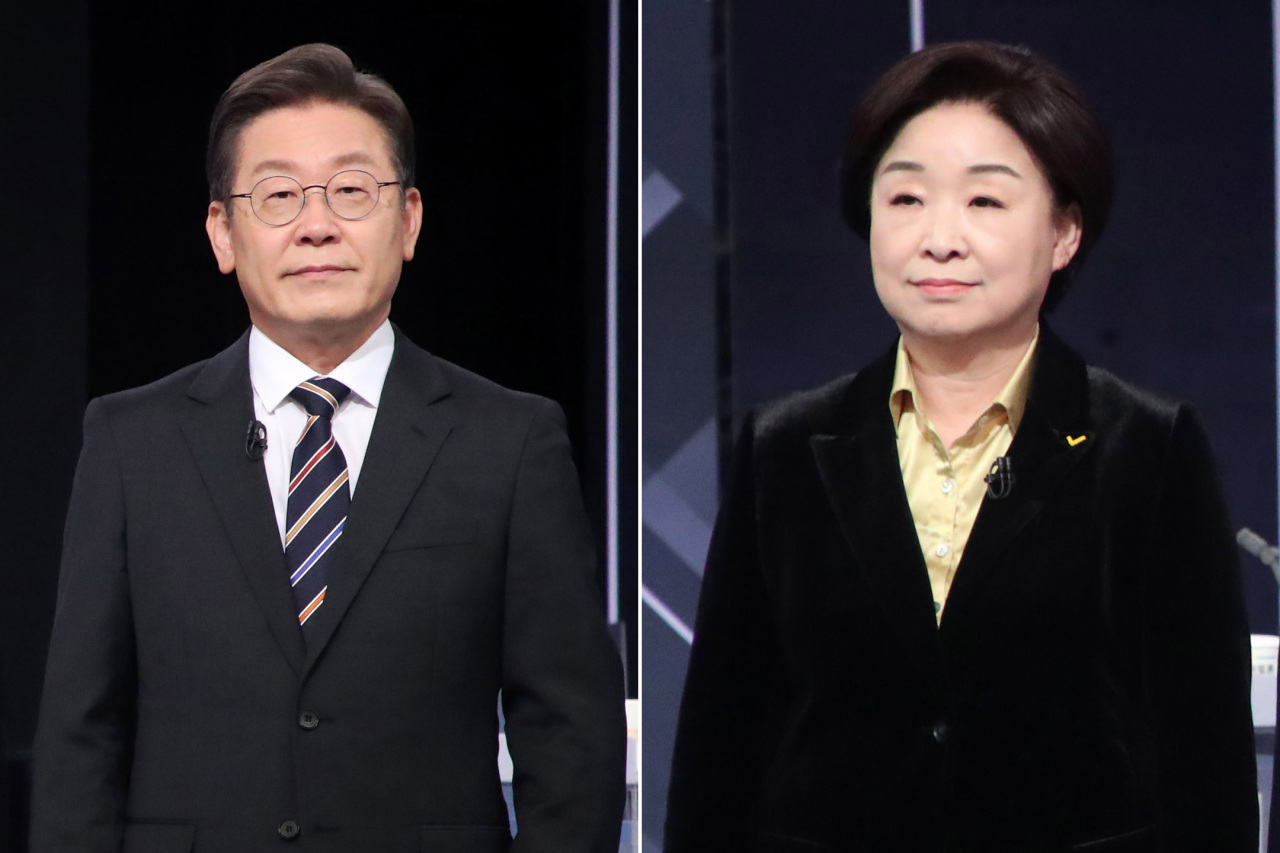 Justice Party candidate Sim Sang-jung (right) Democratic Party candidate Lee Jae-myung (Yonhap)
