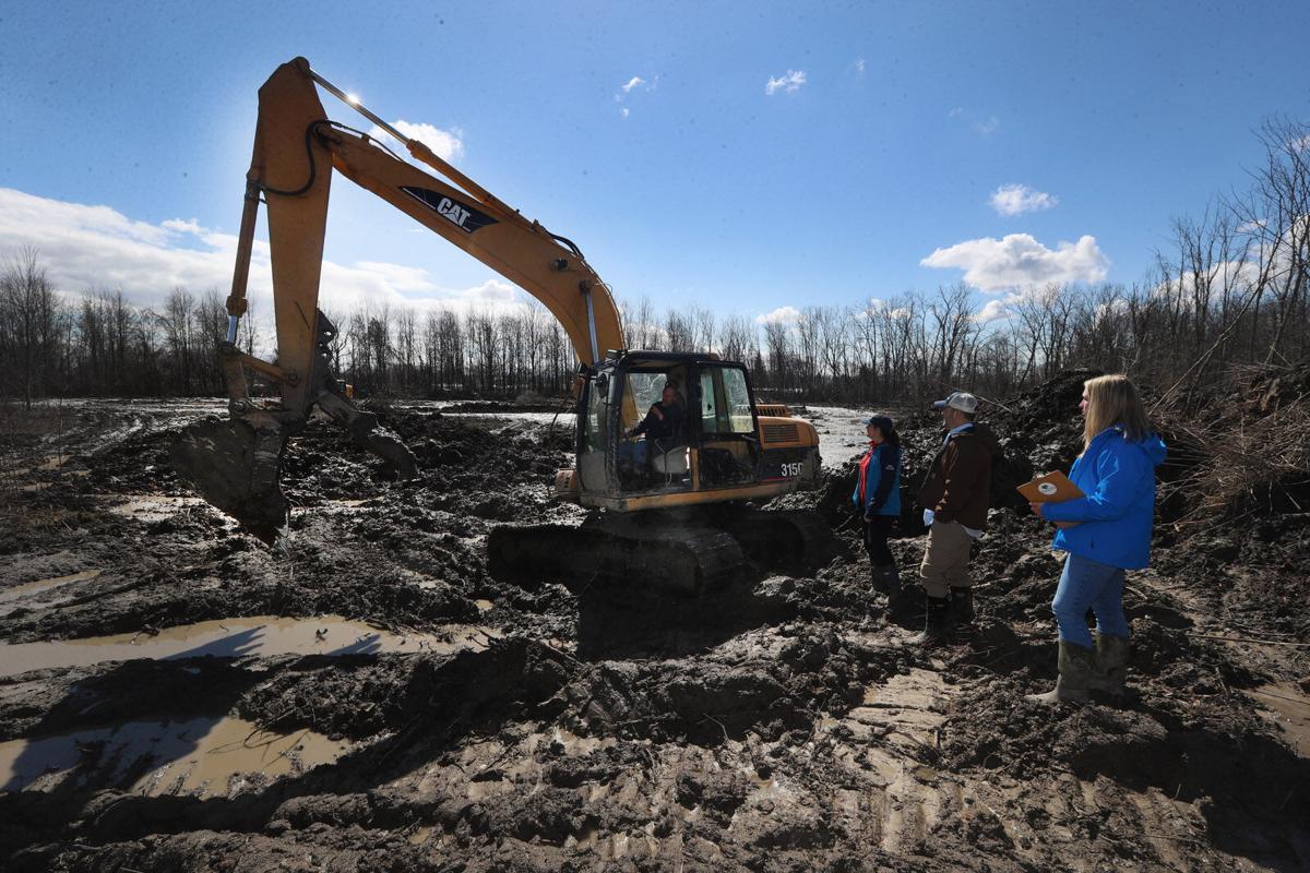 Buffalo Niagara Waterkeeper 's look over start of $2.2 million wetland restoration project along Cayuga Creek (copy)