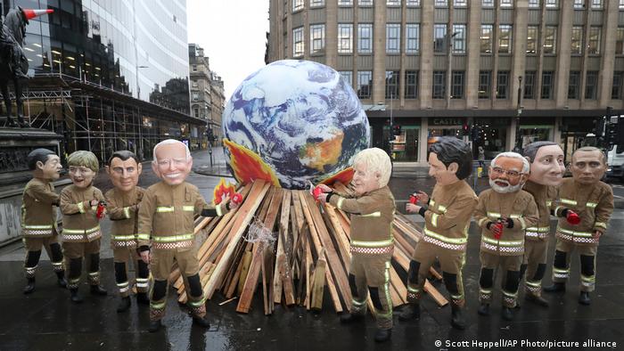 Oxfam activists dressed as world leaders