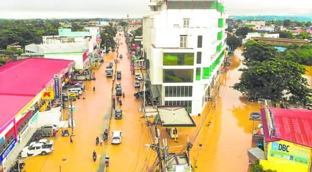 PERENNIAL WOE Roads, streets and homes in Tuguegarao City are submerged at the height of the severe flooding that hit Cagayan province on Nov. 14, 2020. DAVID TE/Contributor