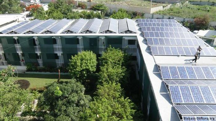 Children's hospital in Haiti with solar panels covering the roof