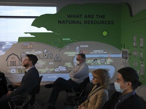 An interactive display is projected onto the walls of the Education Room at the citys Waste Management Centre.