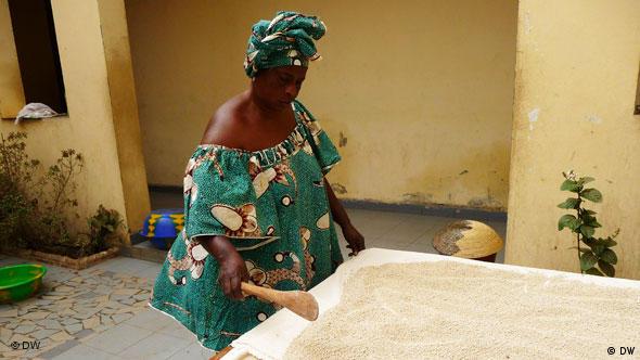 Woman processing millet