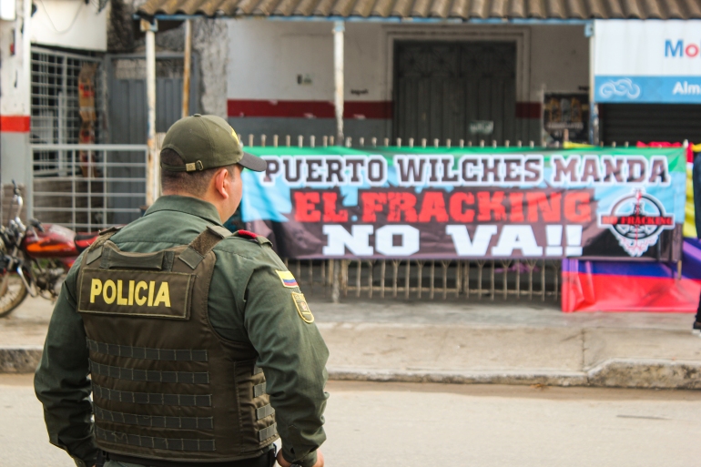 A police officer monitors protest