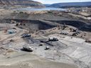 In the area between the two coffer dams at the Site C dam project near Fort St. John, crews excavate and prepare the dam core area, in June 2021, where the earth fill dam will be constructed.