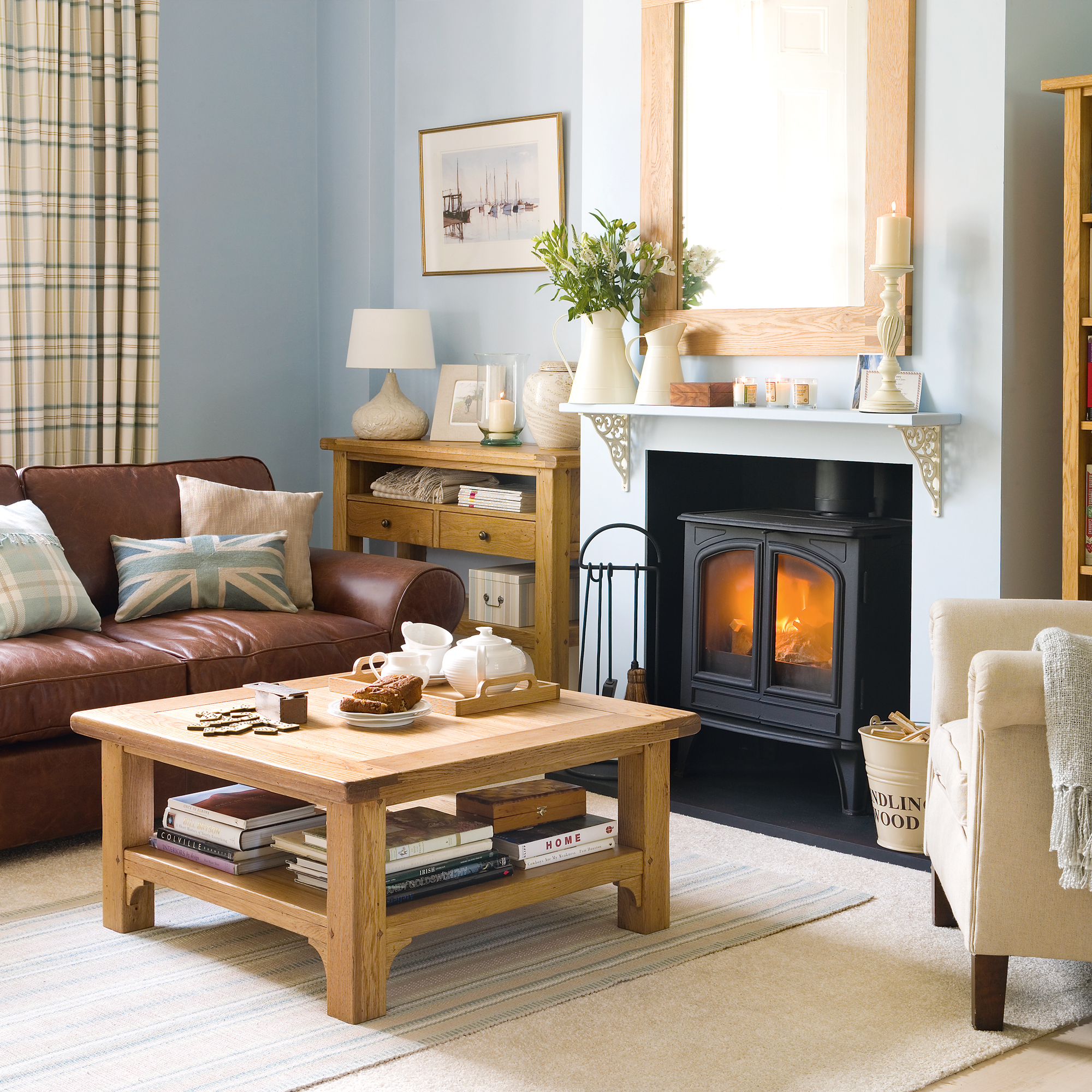 blue living room with wood burning stove